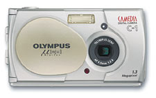 Olympus'  digital &mu;[mju:] Camedia C-1 digital camera, front view with lens cover open. Courtesy of Olympus Europe.