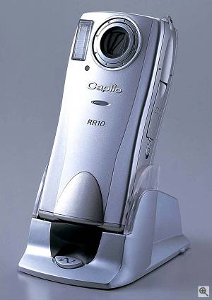 Ricoh's Caplio RR10 digital camera, shown in the included Ricoh BASE docking station. Courtesy of Ricoh DMS Europe B.V. - click for a bigger picture!