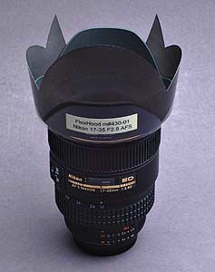 True Digital Photo's 3/4 type FlexHood model m#430-01 attached to the Nikon 17-35mm f/2.8 lens with HB-23 lens hood. Courtesy of True Digital Photo Co.