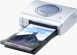 Canon's CP-300 card photo printer. Courtesy of Canon, with modifications by Michael R. Tomkins.