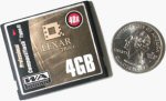 Lexar's 4GB CompactFlash card alongside a quarter for scale. Courtesy of Lexar, with modifications by Michael R. Tomkins.