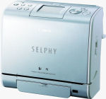 Canon's SELPHY ES1. Courtesy of Canon, with modifications by Michael R. Tomkins.