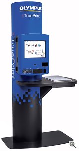 Olympus's TruePrint TP-200 self-service photo kiosk. Courtesy of Olympus America Inc., with modifications by Michael R. Tomkins. Click for a bigger picture!