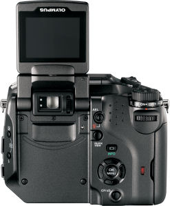 Olympus's Camedia C-7070 Wide Zoom digital camera. Courtesy of Olympus, with modifications by Michael R. Tomkins. Click for a bigger picture!
