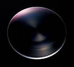 Canon's new multi-layer diffractive optical element. Courtesy of Canon.