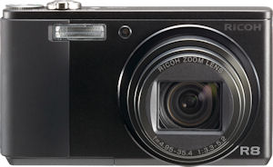 Ricoh's Caplio R8 digital camera. Courtesy of Ricoh, with modifications by Michael R. Tomkins. Click for a bigger picture!