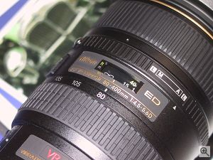 A closeup of the top of Nikon's 80-400MM VR lens. Copyright (c) 2000, Michael R. Tomkins, all rights reserved. Click for a bigger picture!