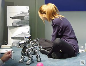 Sony rep demonstrates AIBO. Copyright &copy; 2001, Michael R. Tomkins. All rights reserved. Click for a bigger picture!
