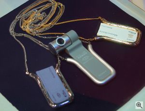 Memory Stick necklace holders and camera. Copyright &copy; 2001, Michael R. Tomkins. All rights reserved. Click for a bigger picture!