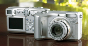 Nikon's Coolpix 4800 digital camera. Courtesy of Nikon, with modifications by Michael R. Tomkins. Click for a bigger picture!