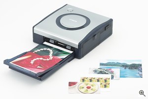 Canon's CP-100 dye sublimation printer. Courtesy of Canon Inc., with modifications by Michael R. Tomkins. Click for a bigger picture!