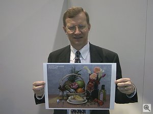 Dave Etchells holding a print from Minolta's Dimage 7 digital camera. Copyright (c) 2001, Michael R. Tomkins, all rights reserved. Click for a bigger picture!