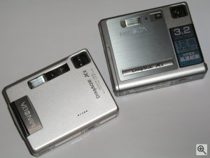 Minolta's DiMAGE Xt digital camera (prototype) alongside the existing DiMAGE Xi model. Copyright (c) 2003, Michael R. Tomkins. All rights reserved.
