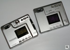 Minolta's DiMAGE Xt digital camera (prototype) alongside the existing DiMAGE Xi model. Copyright (c) 2003, Michael R. Tomkins. All rights reserved.