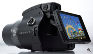 Sony's Cyber-shot DSC-H9 digital camera. Courtesy of Sony, with modifications by Michael R. Tomkins. Click for a bigger picture!