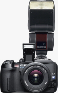 Olympus' EVOLT E-300 digital SLR. Courtesy of Olympus, with modifications by Michael R. Tomkins. Click for a bigger picture!