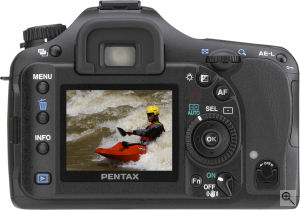 Pentax's K10D single-lens reflex digital camera. Courtesy of Pentax, with modifications by Michael R. Tomkins. Click for a bigger picture!