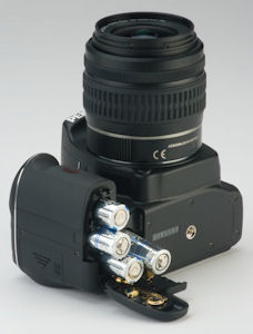 Pentax's K2000 digital SLR. Courtesy of Pentax, with modifications by Michael R. Tomkins. Click for a bigger picture!