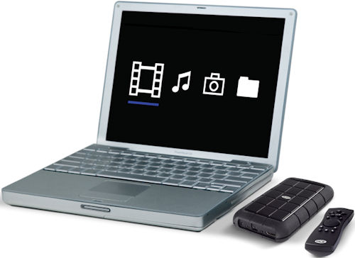 LaCie's LaCinema Rugged HD and remote control alongside an unidentified notebook for scale comparison. Photo provided by LaCie USA. Click for a bigger picture!