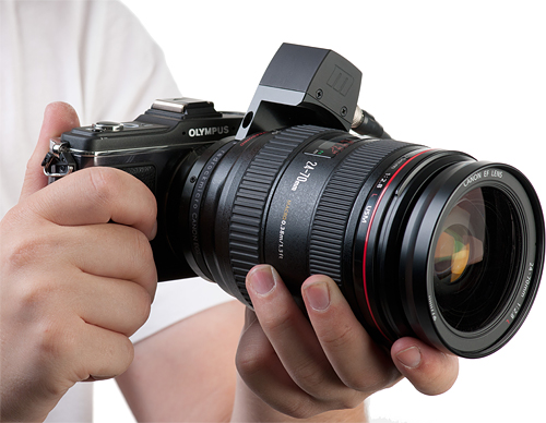 The Redrock Micro LiveLens MFT adapter includes a control pad allowing aperture control in 1/3-stop increments with most Canon lenses. Photo provided by Redrock Micro. Click for a bigger picture!