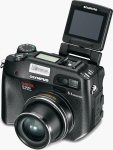Olympus' C-5060 digital camera. Courtesy of Olympus, with modifications by Michael R. Tomkins.
