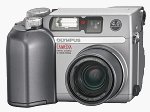 Olympus' Camedia C-4000 Zoom digital camera. Courtesy of Olympus, with modifications by Michael R. Tomkins.
