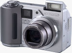 Olympus' Camedia C-5500 Sport Zoom digital camera. Courtesy of Olympus, with modifications by Michael R. Tomkins.