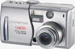 Olympus' Camedia C-60 Zoom digital camera. Courtesy of Olympus, with modifications by Michael R. Tomkins.