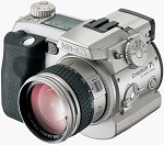 Minolta's DiMAGE 7i digital camera. Courtesy of Minolta, with modifications by Michael R. Tomkins.