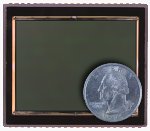 Kodak's KAF-22000CE image sensor, shown with a US quarter for scale. Courtesy of Eastman Kodak Co., with modifications by Michael R. Tomkins.