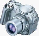 Canon's PowerShot S1 IS digital camera. Courtesy of Canon, with modifications by Michael R. Tomkins.