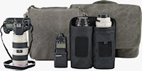 The Retrospective camera shoulder bags (background) and lens changer shoulder bags (foreground) feature tough, understated designs in either Pinestone Cotton canvas, or Black Poly Spun canvas. Photo provided by Think Tank Photo LLC.