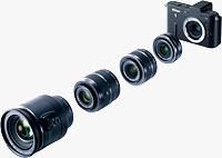 The Nikon V1 compact system camera shown with all four lenses. Photo provided by Nikon Inc.