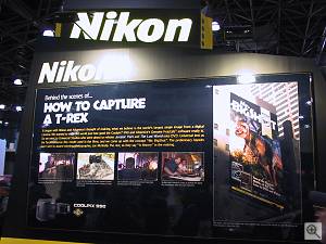 A description and photo of Nikon's T-Rex image, from Nikon's booth at PhotoPlus Expo East in New York. Copyright (c) 2000, Michael R. Tomkins, all rights reserved. Click for a bigger picture!