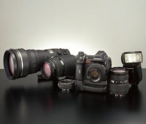 Olympus' E System group of products. Courtesy of Olympus, with modifications by Michael R. Tomkins. Click for a bigger picture!
