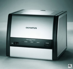 Olympus' P-11 photo printer. Courtesy of Olympus, with modifications by Michael R. Tomkins. Click for a bigger picture!