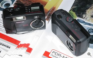 Toshiba's PDR-3300 digital camera compared with the previous PDR-M71 model. Copyright © 2002, Michael R. Tomkins. All rights reserved. Click for a bigger picture!