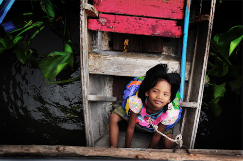 'Can't Stop Smiling' by Bossakorm Buena Photo provided by Scott Kelby. Click for a bigger picture!