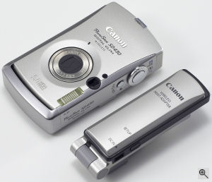 Canon's PowerShot SD430 Digital ELPH. Courtesy of Canon, with modifications by Michael R. Tomkins. Click for a bigger picture!