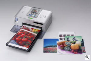 Canon's SELPHY CP710 printer. Courtesy of Canon, with modifications by Michael R. Tomkins. Click for a bigger picture!