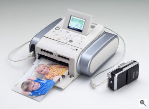 Canon's SELPHY DS810 printer. Courtesy of Canon, with modifications by Michael R. Tomkins. Click for a bigger picture!