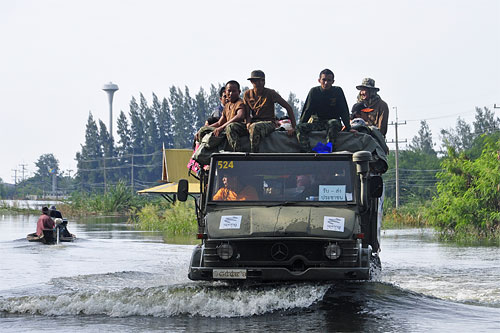 Military vehicles can handle fairly deep water, but even they'd be of no use in the worst-hit areas. Photo by Suriya Thonawik, provided with public domain license by Fotopedia.com. Click to see the original picture on Fotopedia.com!