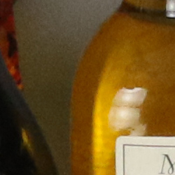 100% crop from Canon 7D Mark II test image taken at ISO 3200