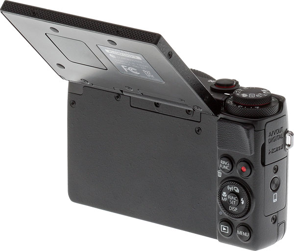 Canon G7 X review -- 3/4 rear view with LCD up