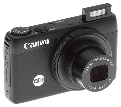 Canon S120 review -- Front right quarter view with flash