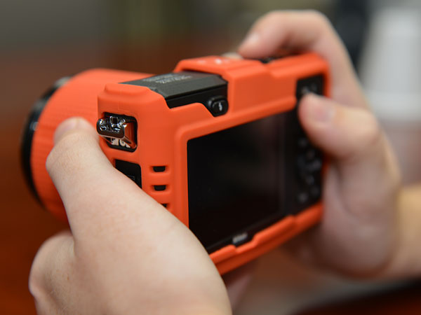 Nikon AW1 Review -- Rear quarter view in-hand