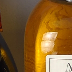 100% crop from Olympus E-M1 II test image taken at ISO 64