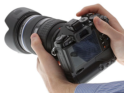 Olympus OM-D E-M1 review -- in hand with Four Thirds lens