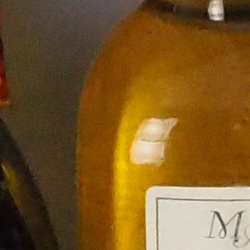 100% crop from Olympus E-M10 test image taken at ISO 3200