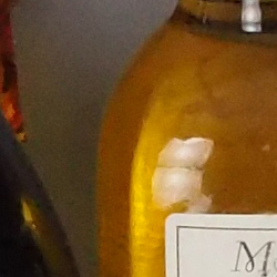 100% crop from Olympus E-M5 II test image taken at ISO 3200
